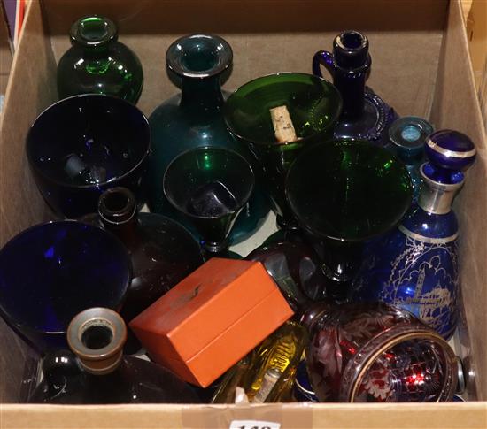 A collection of mixed coloured glassware
